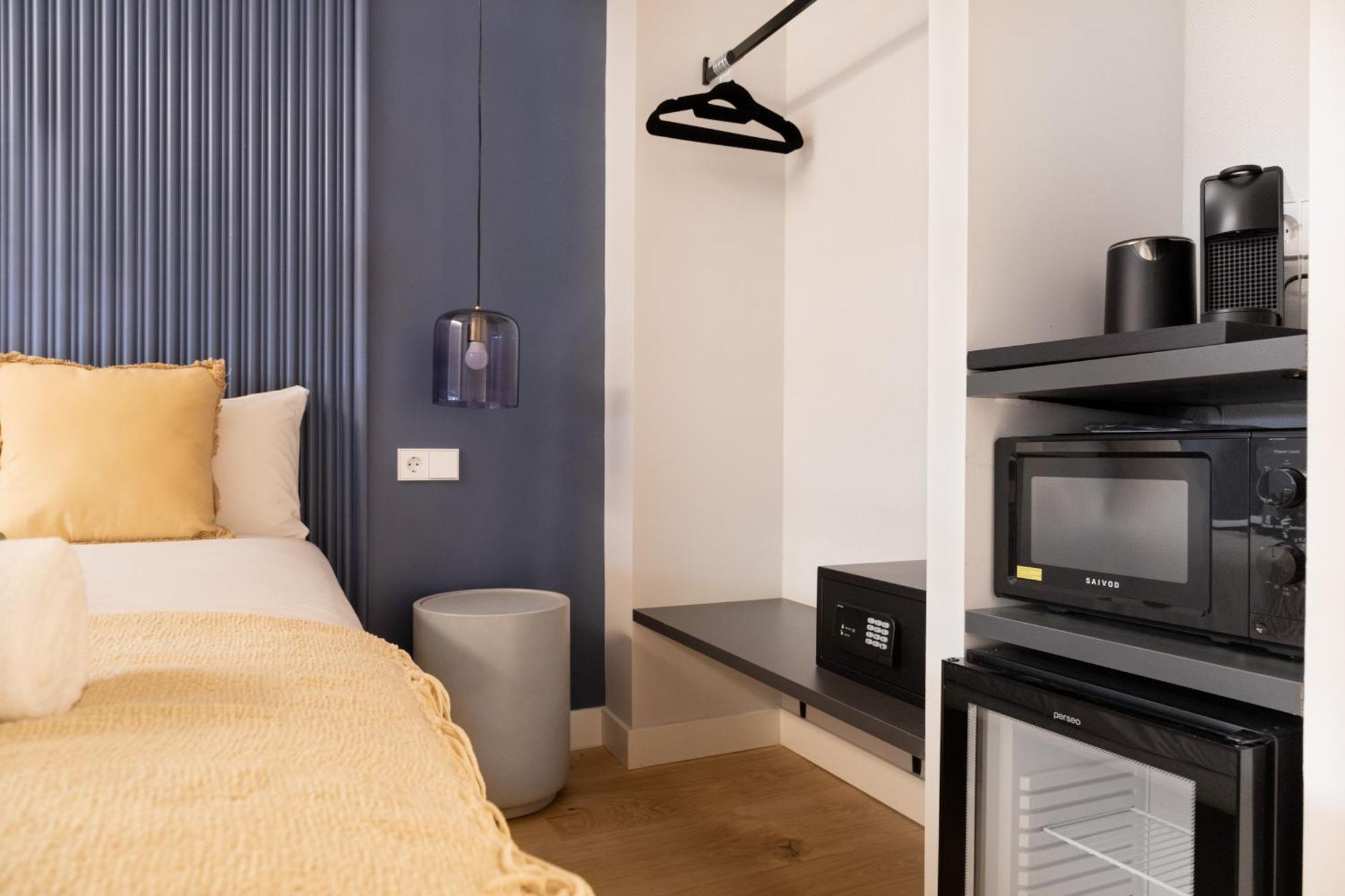 Calma Rooms By Charming — Photos 1